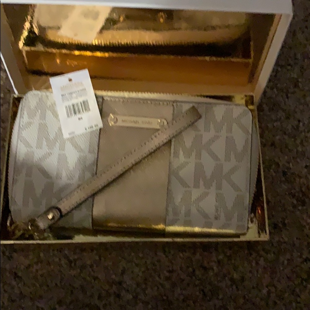 Michael Kors gold stripe phone case wristlet
